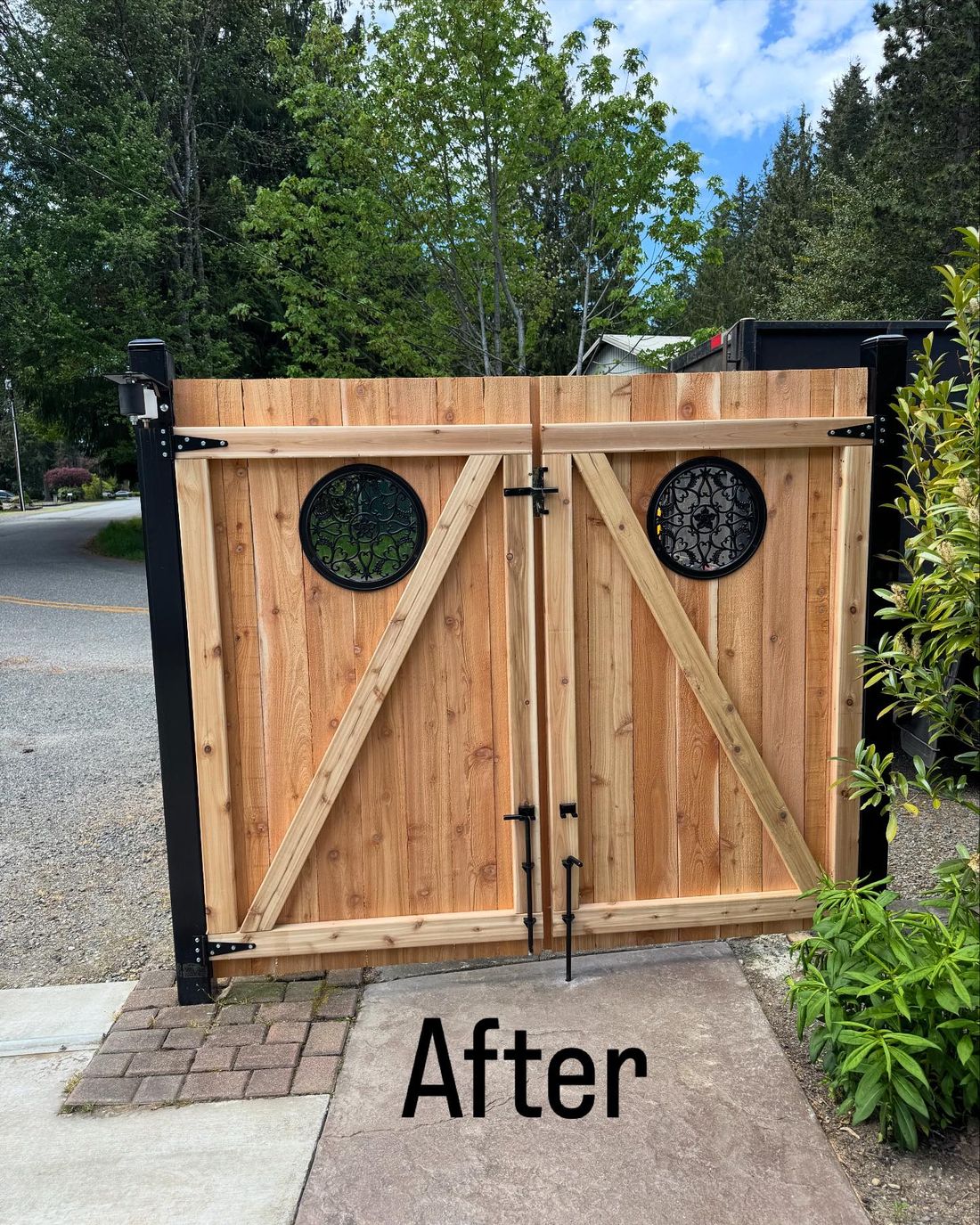 After: new cedar double gate with round metal inserts